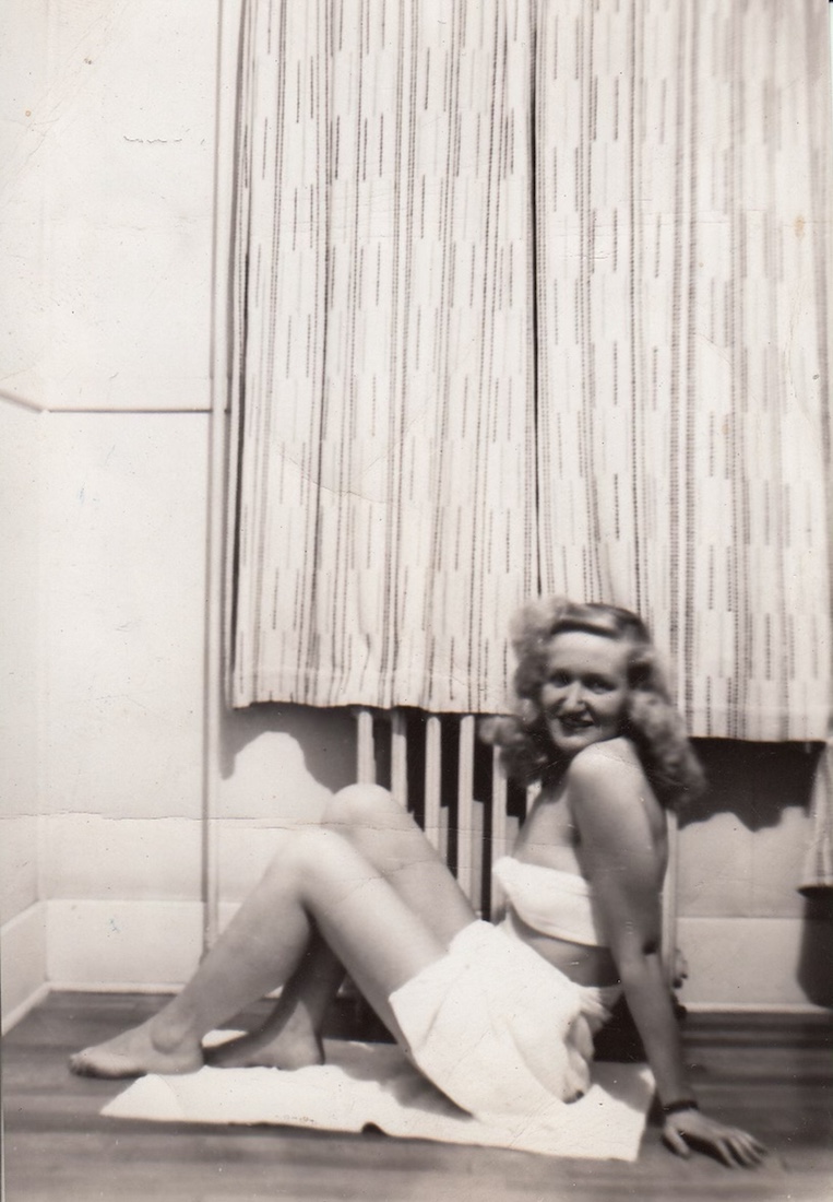 blond woman 1940 ish? bikini of the day, white top with white skirt bottom
